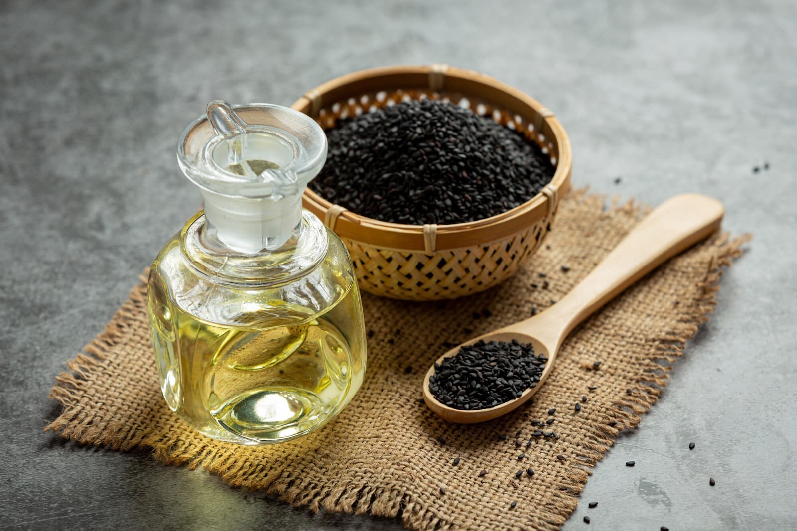 Oil and raw seeds on the table